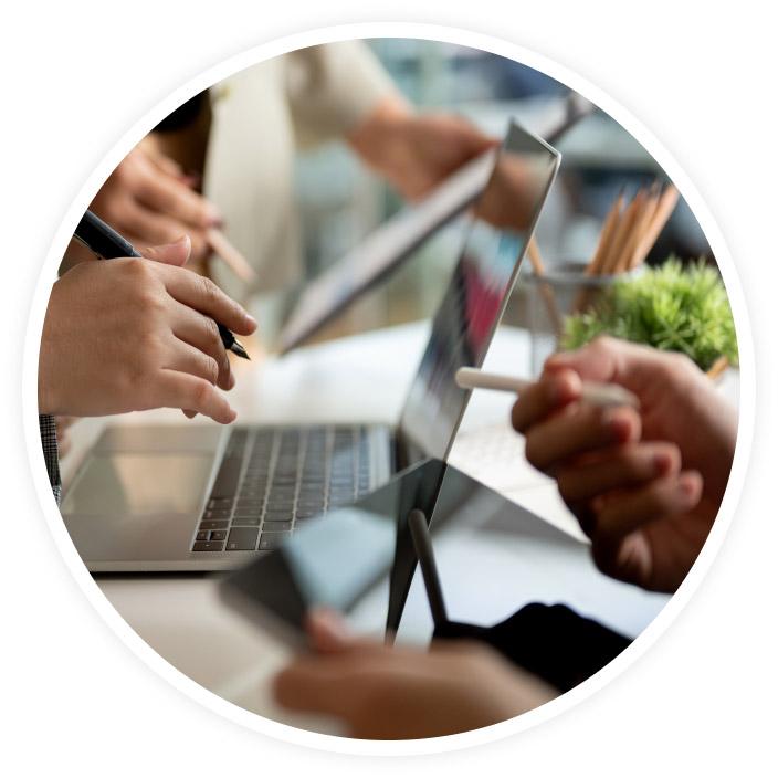 hands on a laptop