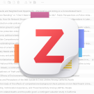 Red Z Zotero icon over a blurred listing of research articles